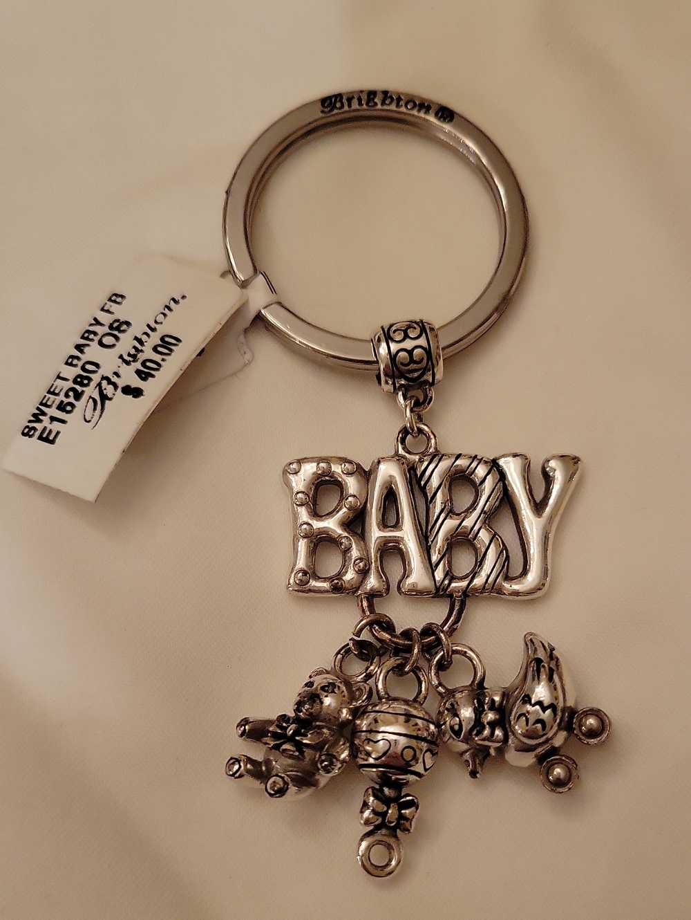 Brighton silver-tone "BABY" charm keyring with baby dangles